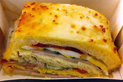 cocoandme_croque_classic Coco&Me - www.cocoandme.com - Coco and Me - La Grande Épicerie de Paris - 'Le Croque Classic'. An indulgent looking sandwich made of bread, turkey, pancetta, cheddar, tomato, cucumber, hard boiled egg, iceberg salad, mayonnaise & worcestershire sauce. 5.90 euros. - Paris